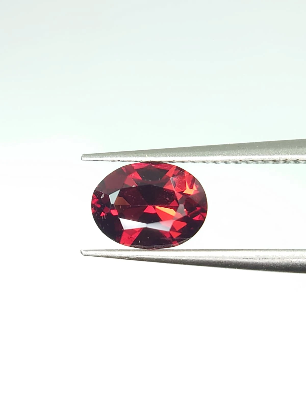 1.56ct Natural Malaya Garnet Oval Cut From Tanzania — view 1
